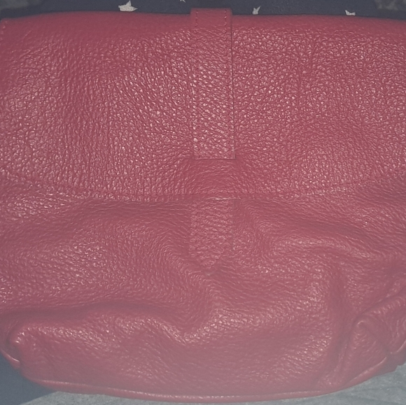 New buttery leather red crossbody. Snap Closure. Clean Inside. 1 Pocket In/out. - Picture 8 of 8